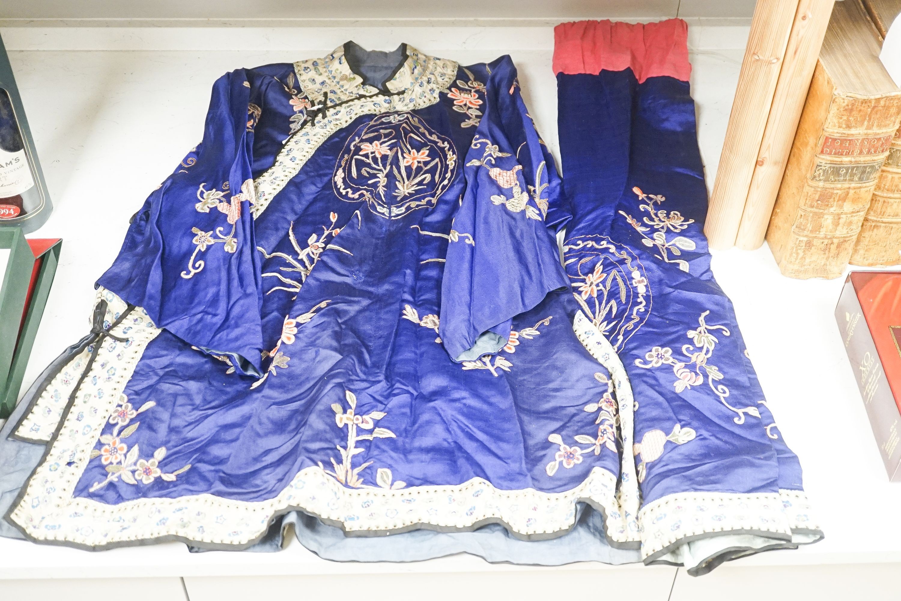 A Chinese embroidered silk robe and a matching pair of trousers